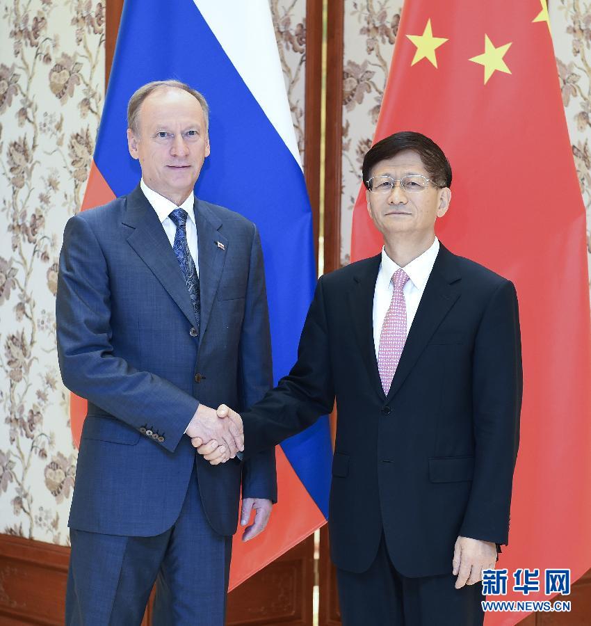 9月13日,中共中央政治局委員、中央政法委書(shū)記孟建柱在北京同俄羅斯聯(lián)邦安全會(huì)議秘書(shū)帕特魯舍夫共同主持中俄執(zhí)法安全合作機(jī)制第三次會(huì)議。新華社記者張領(lǐng)攝 9月13日,中共中央政治局委員、中央政法委書(shū)記孟建柱在北京同俄羅斯聯(lián)邦安全會(huì)議秘書(shū)帕特魯舍夫共同主持中俄執(zhí)法安全合作機(jī)制第三次會(huì)議。新華社記者張領(lǐng)攝